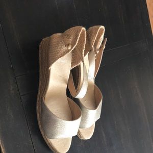 Castaner gold and burlap espadrilles.